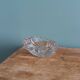 Shell-shaped crystal paperweight.