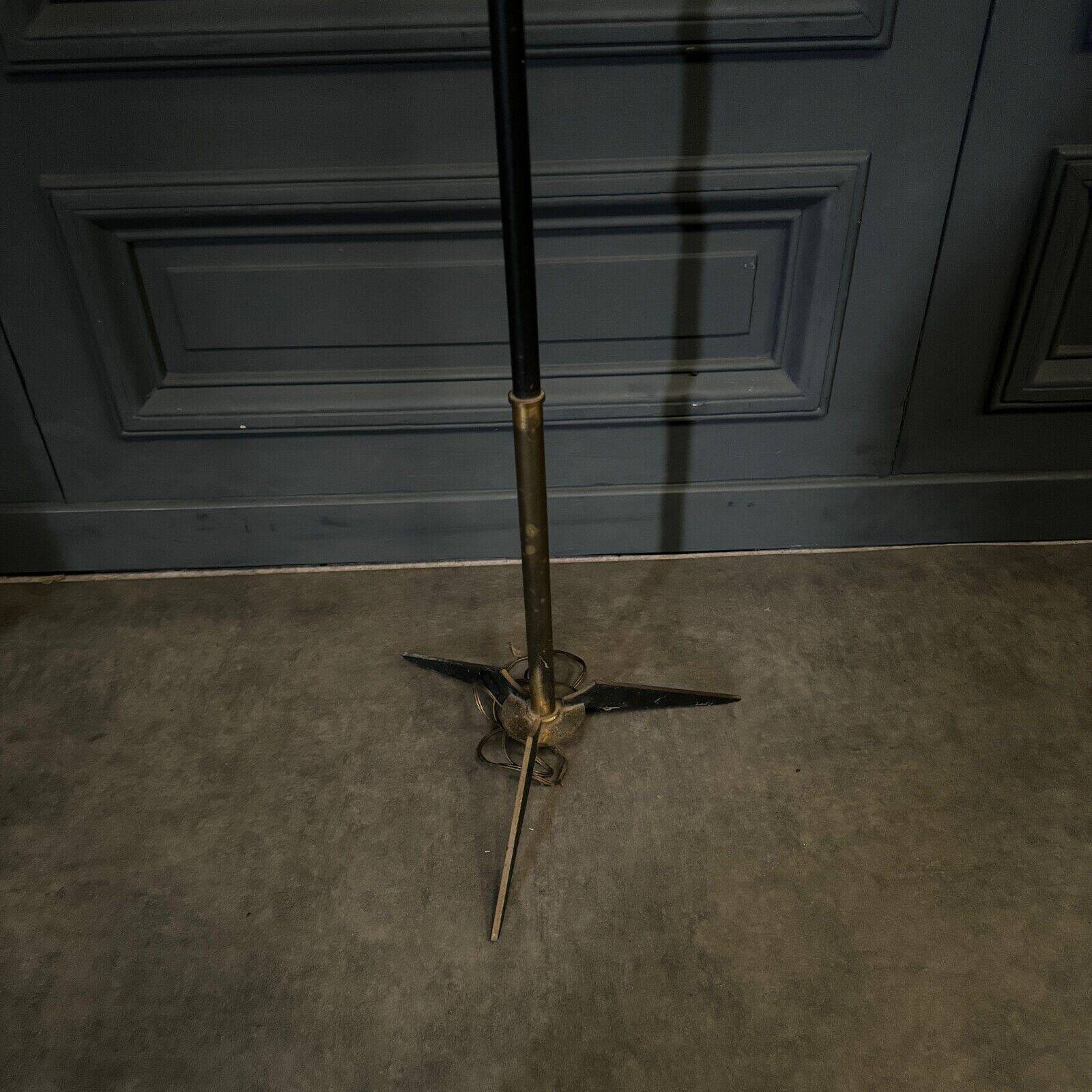 1960 floor lamp on gold metal winged base with black barrel
