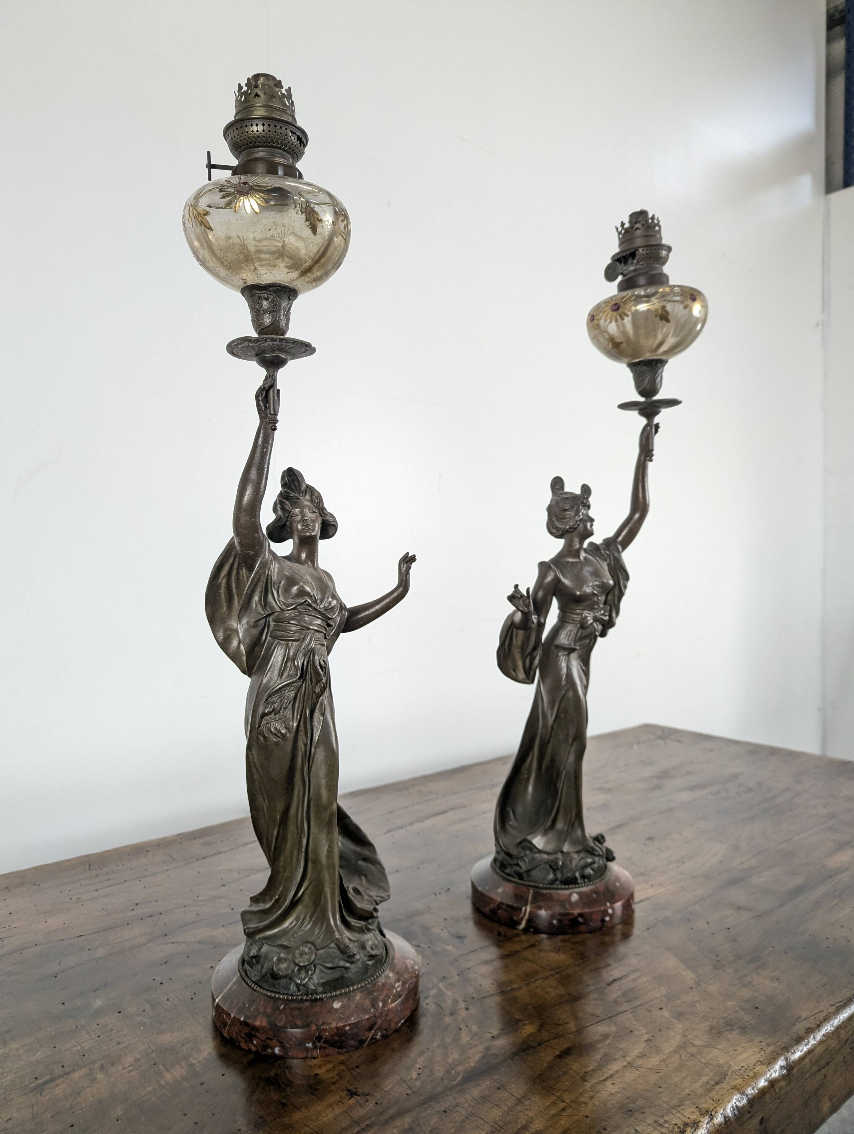 Pair of Art Nouveau oil lamps in cast iron