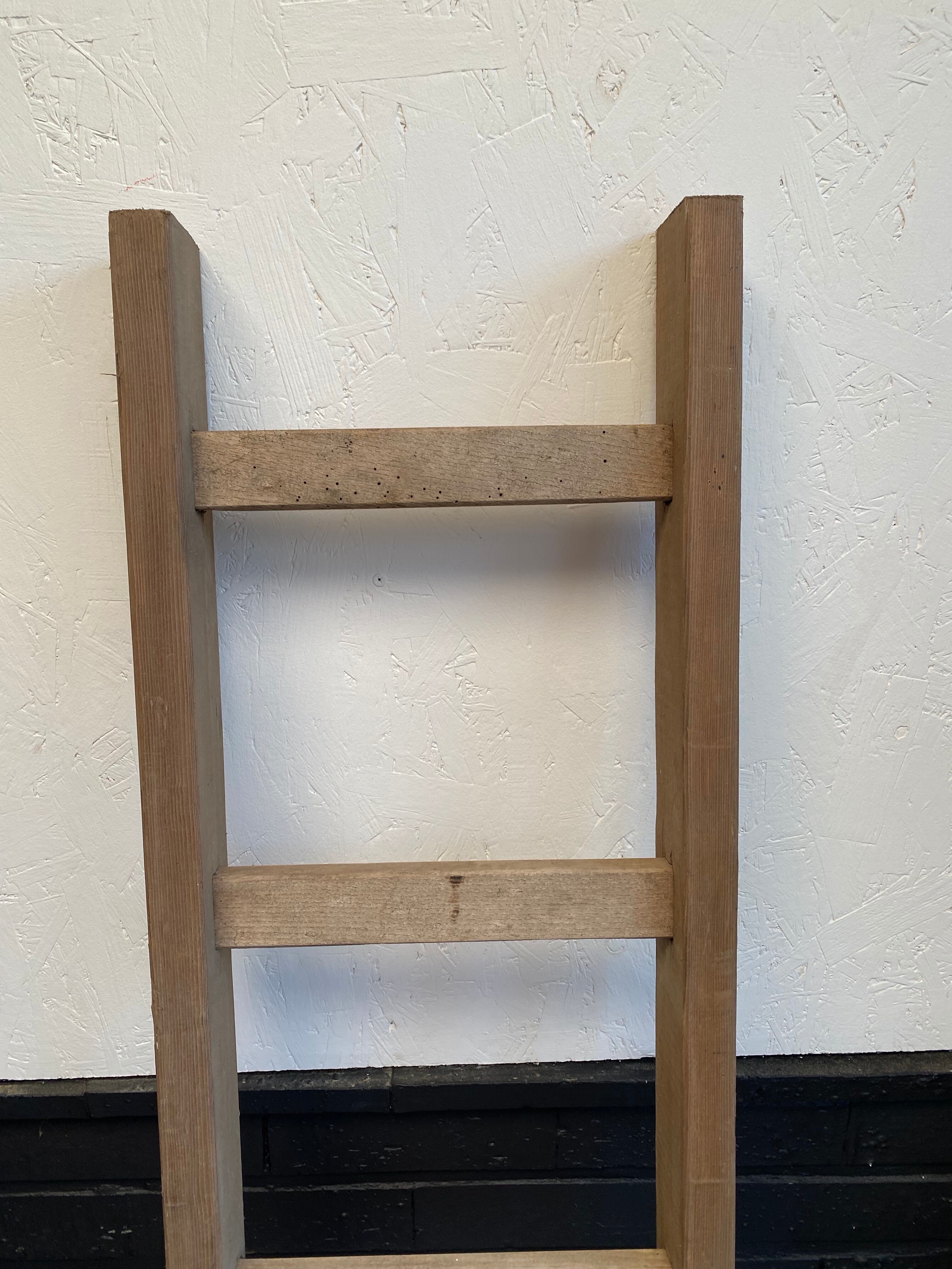 Wooden farm ladder