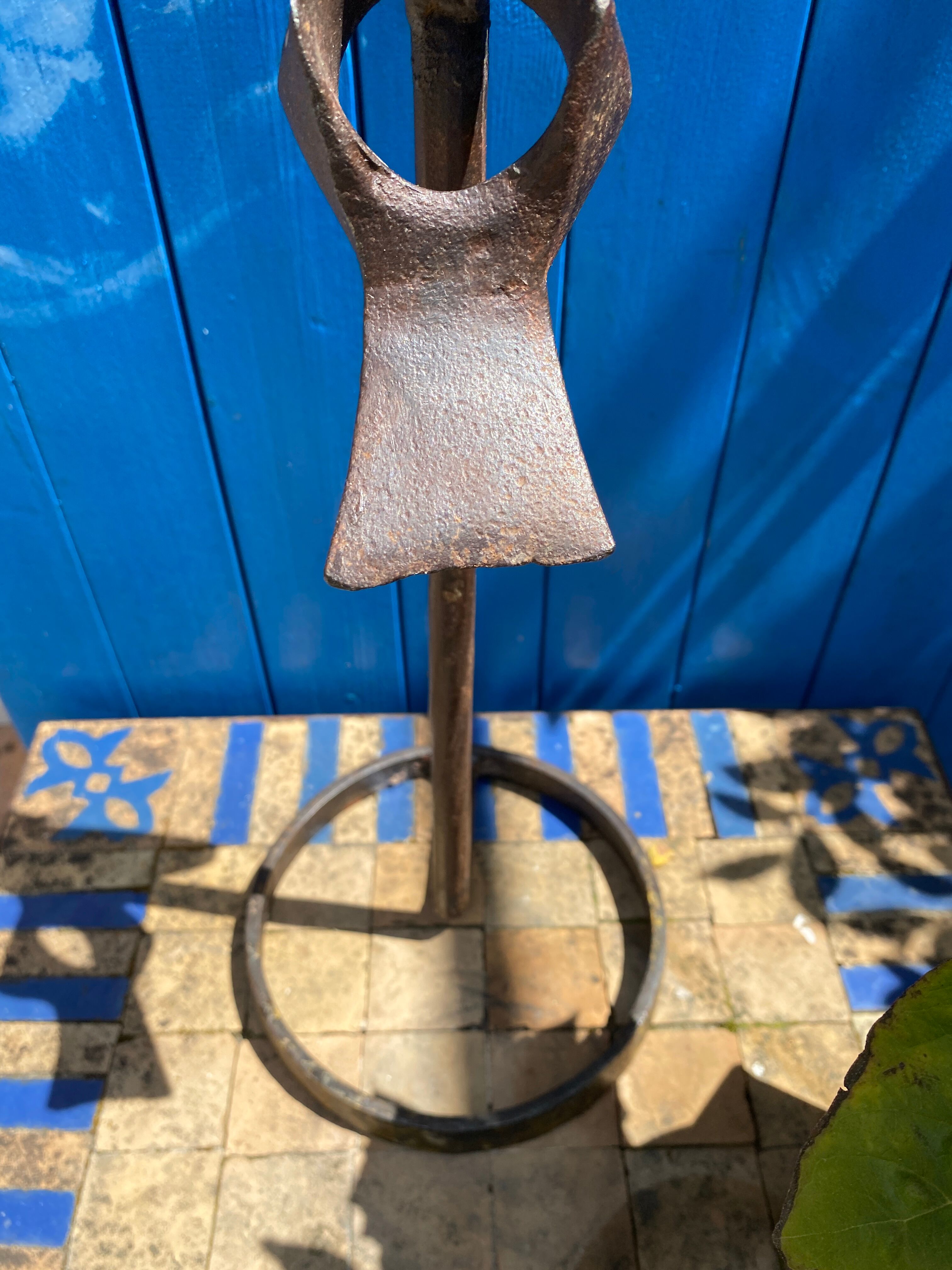 Brutalist iron candlestick on a stand