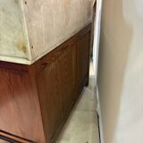 Antique wood and marble kitchen sideboard with carved backsplash