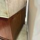Antique wood and marble kitchen sideboard with carved backsplash