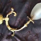 Bronze wall light with opaque glass tulip 1900