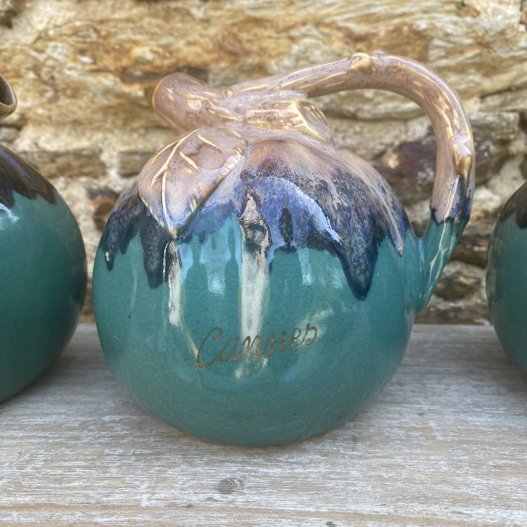 Alpho ceramic apple bottles from the 60s-70s.