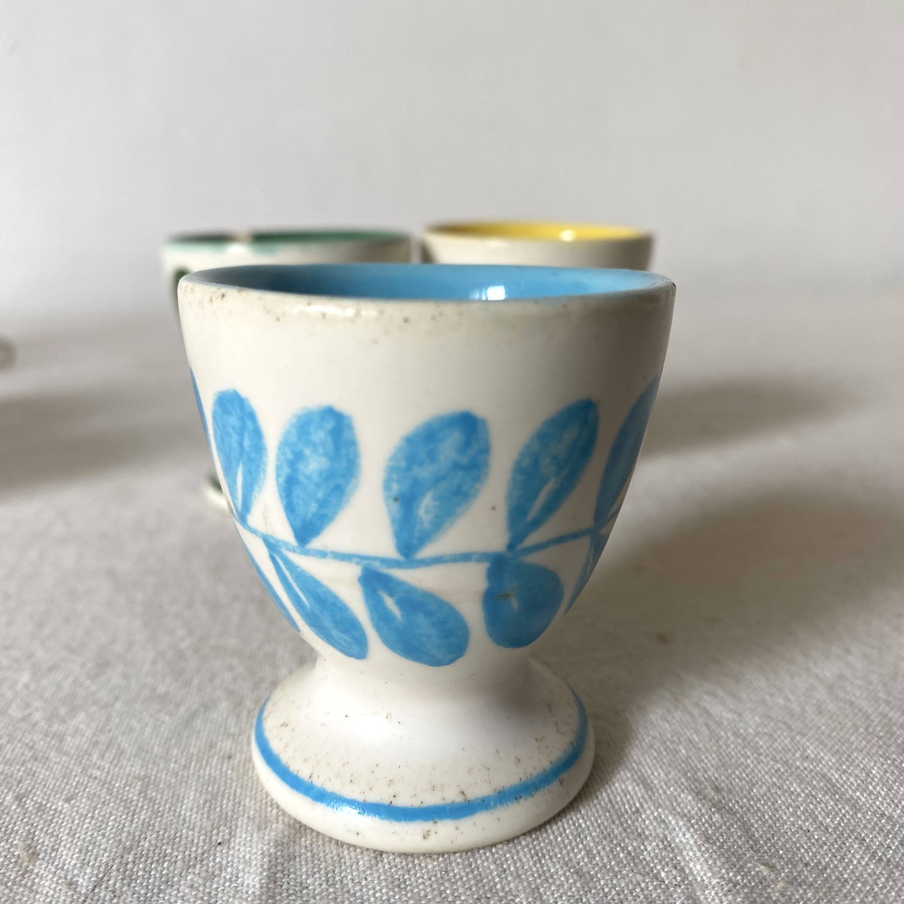 Antique earthenware egg cups