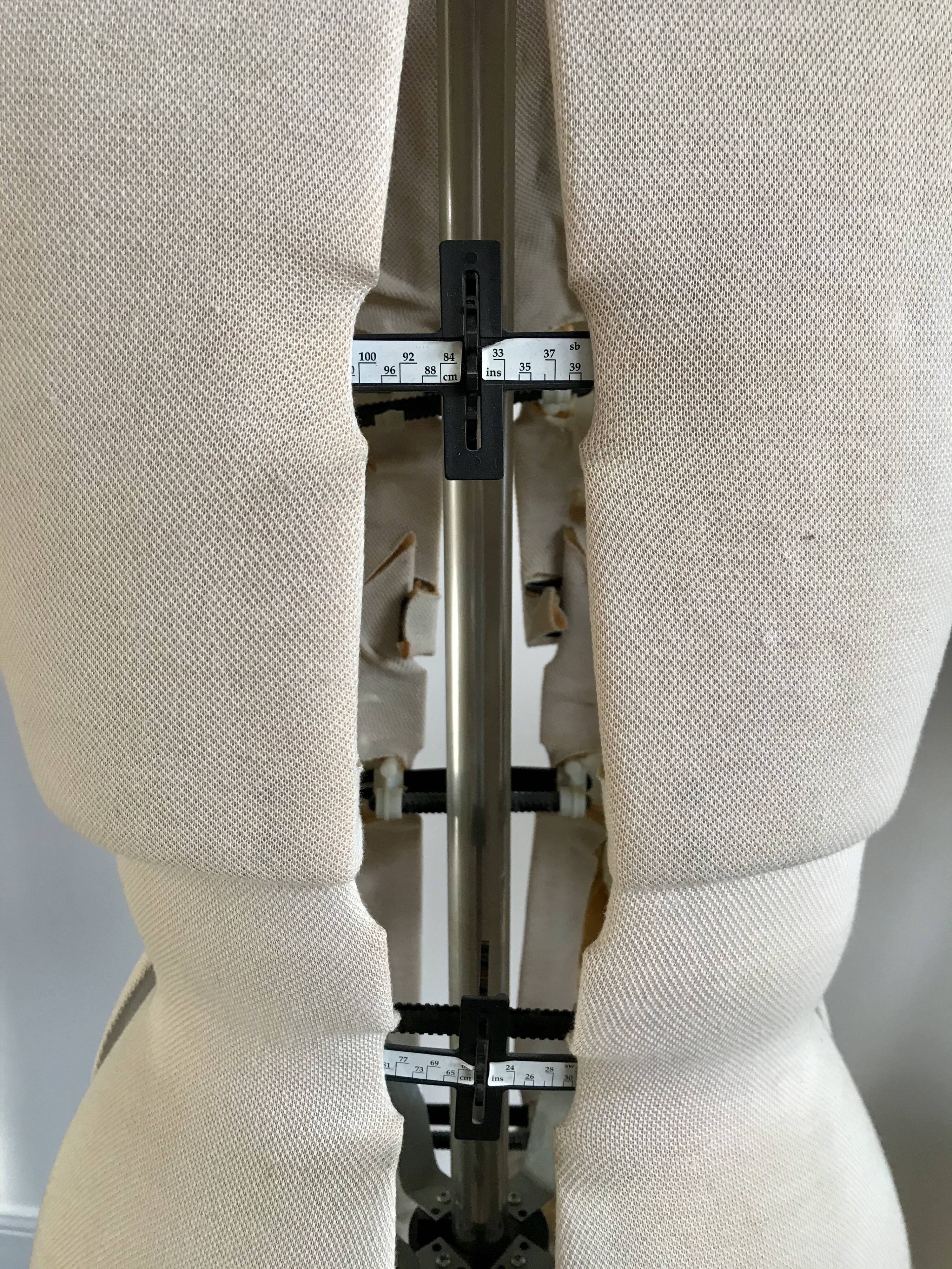 Wooden mannequin and fabric 70s