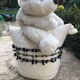 Pouf de sol en laine "a cheval"