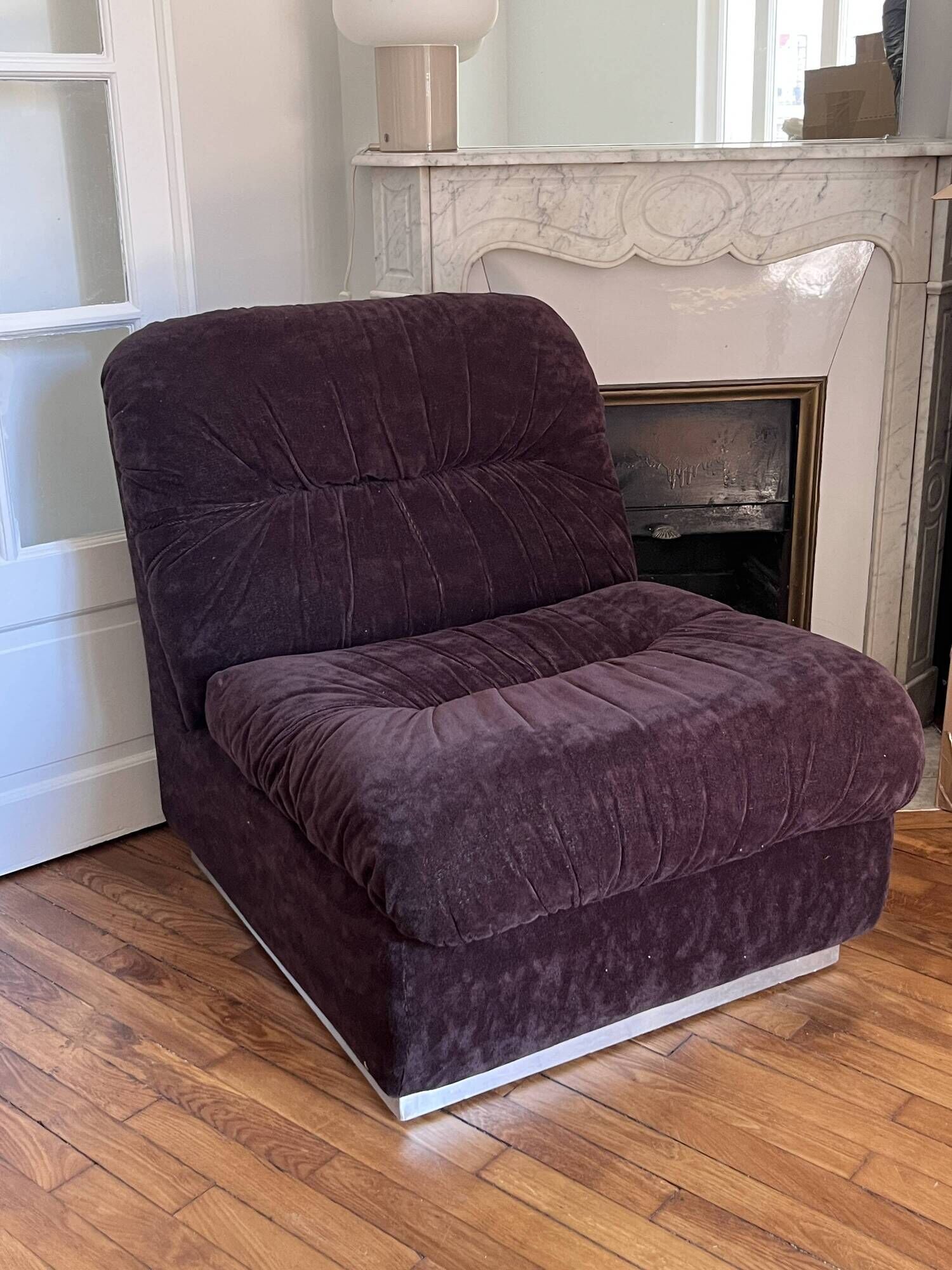 Vintage 1970s lounge chair in chocolate brown velvet with a chrome base.