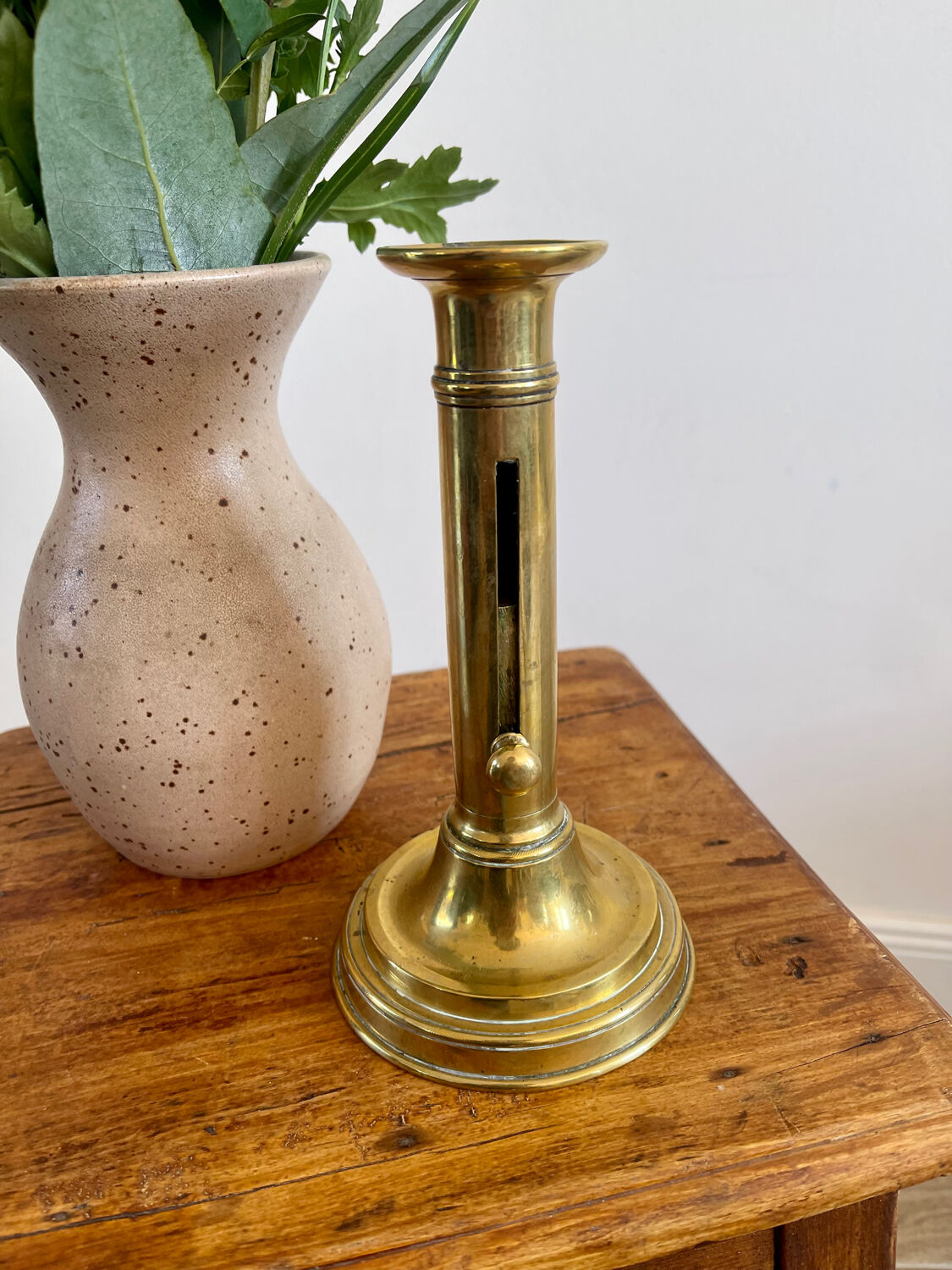 Brass push candle holder