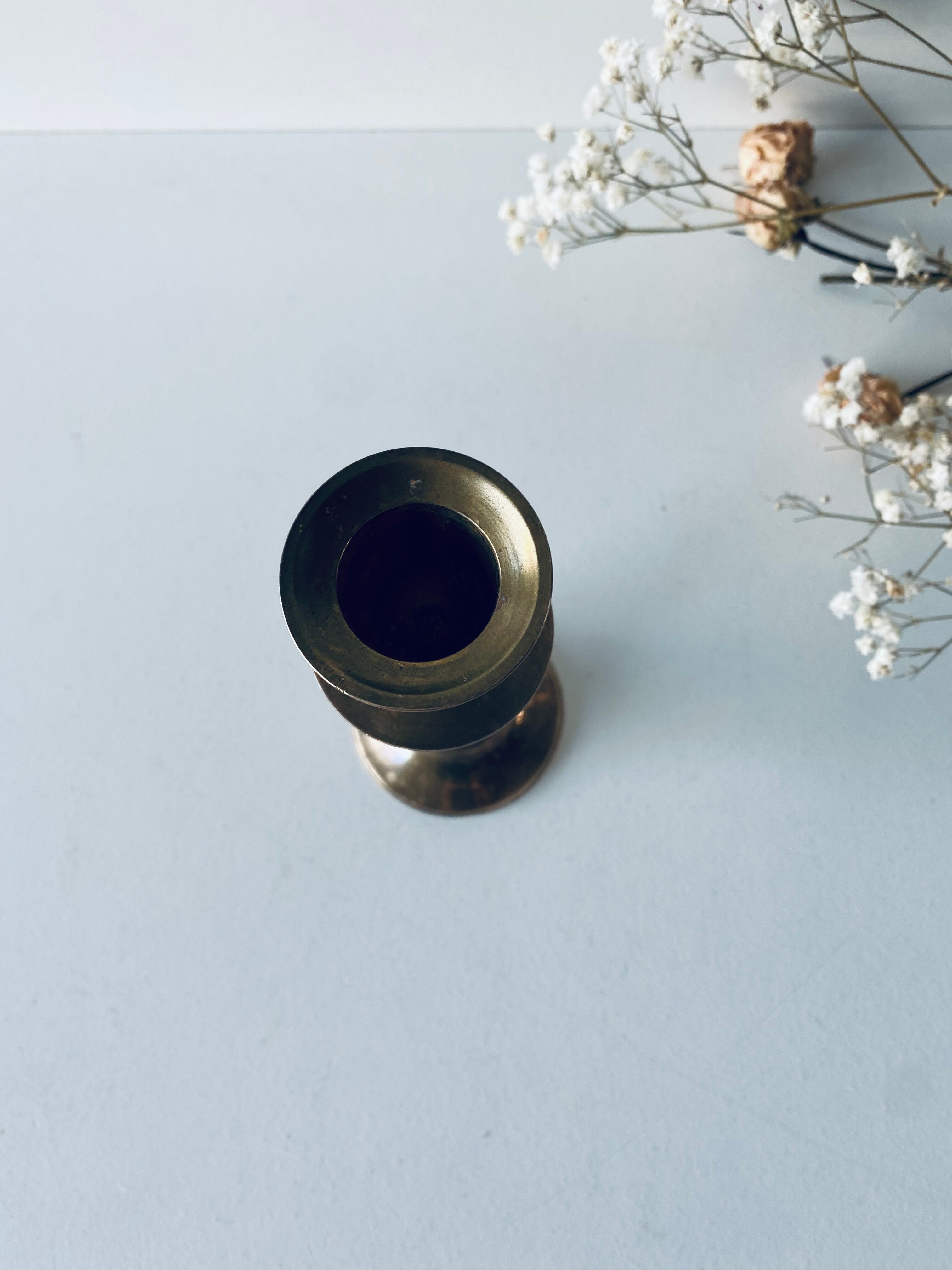 Twisted brass candle holder