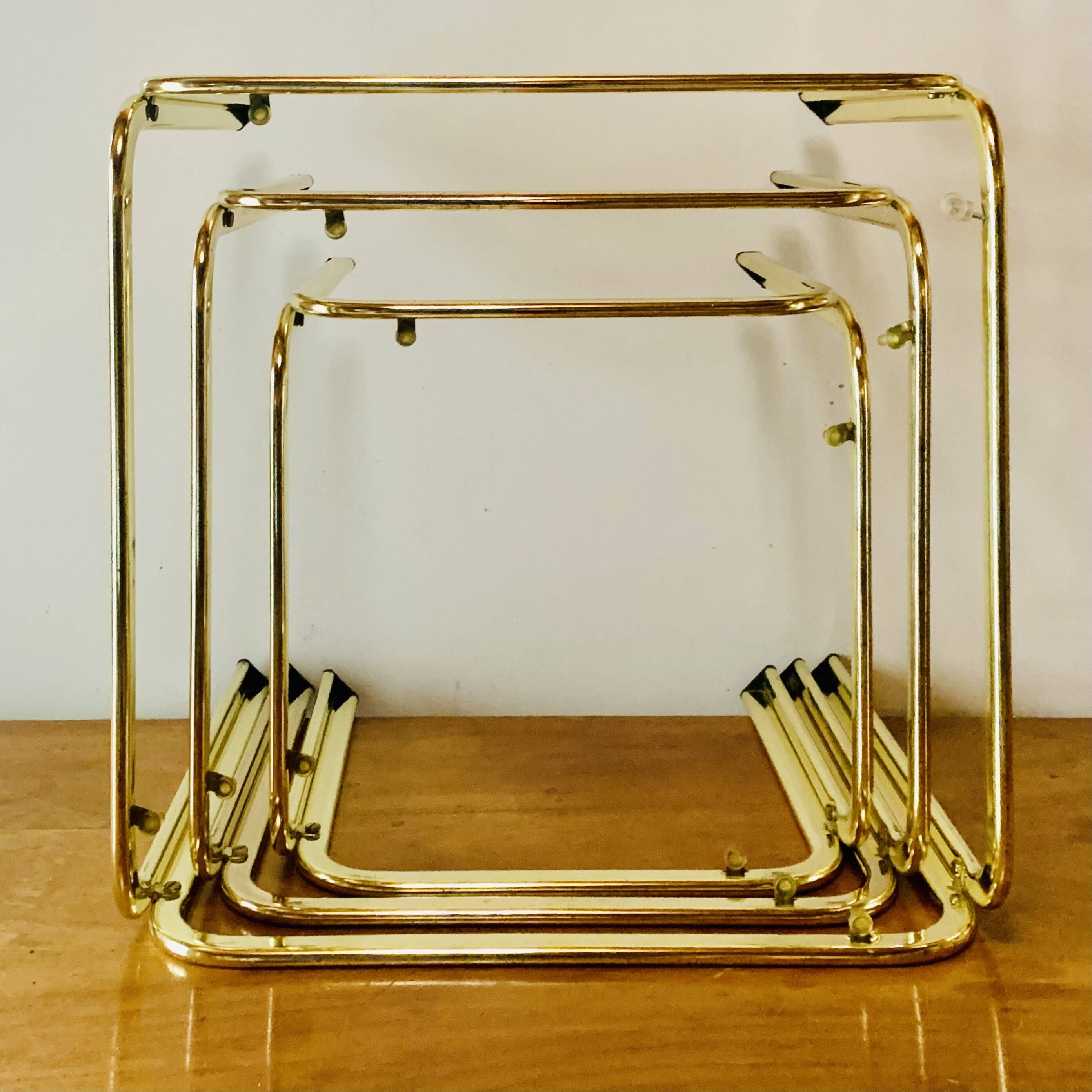 Vintage nesting tables in gold metal and smoked glass