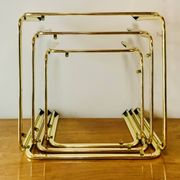 Vintage nesting tables in gold metal and smoked glass