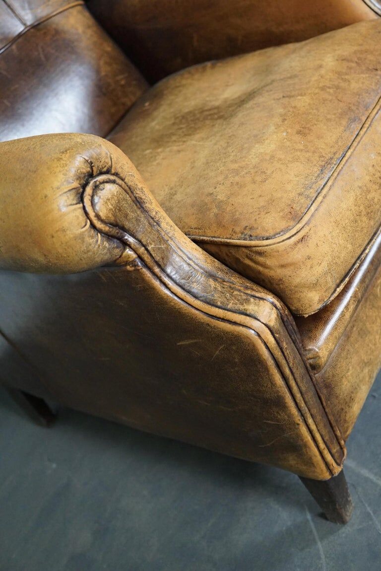 Vintage club chair with leather ears cognac Netherlands
