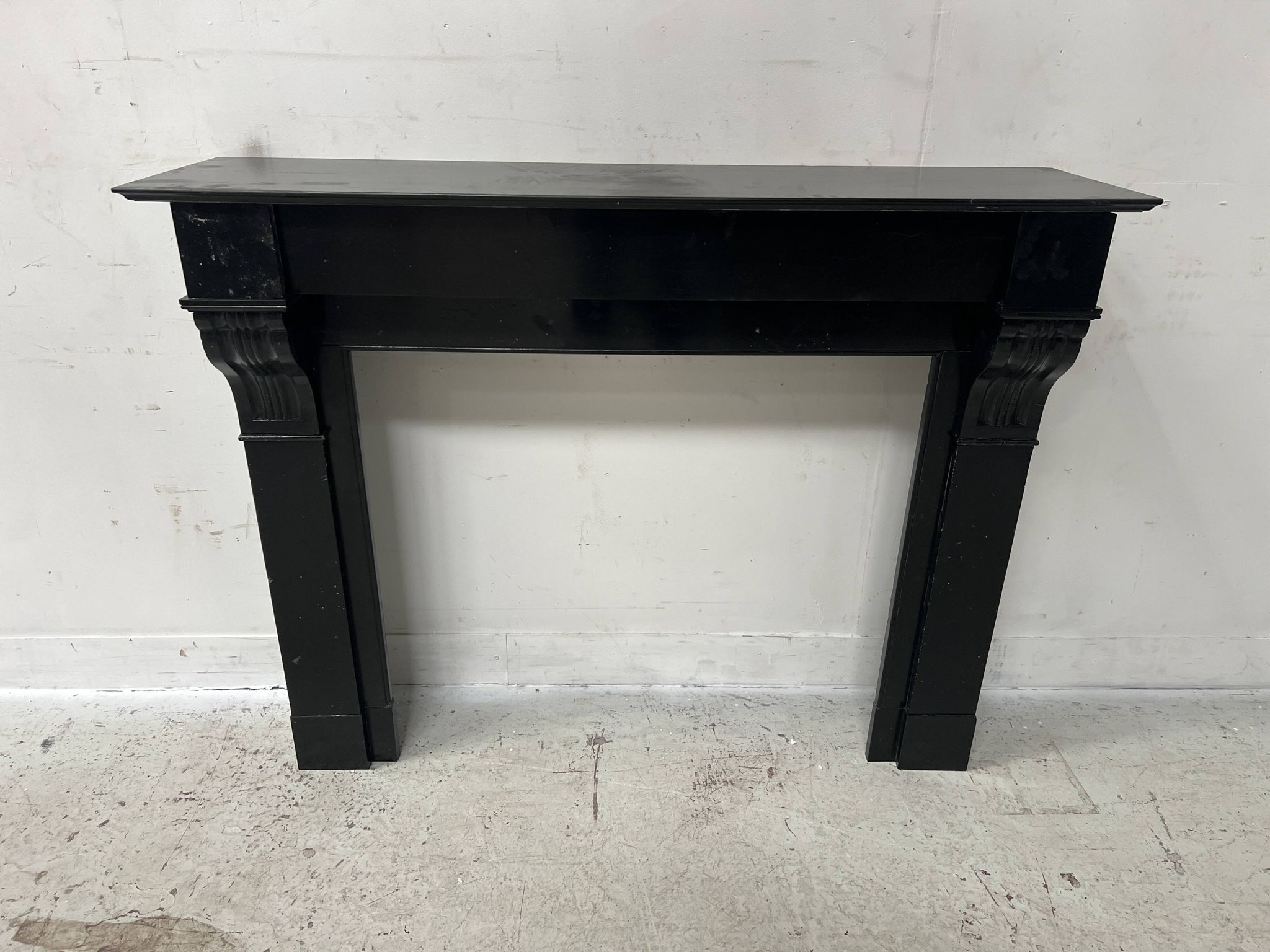 Napoleon III period fireplace with a black marble corbel. 19th century.