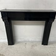 Napoleon III period fireplace with a black marble corbel. 19th century.