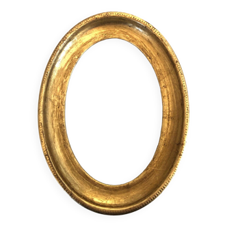 Old oval gilded wood frame