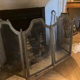 Old brass fire shield