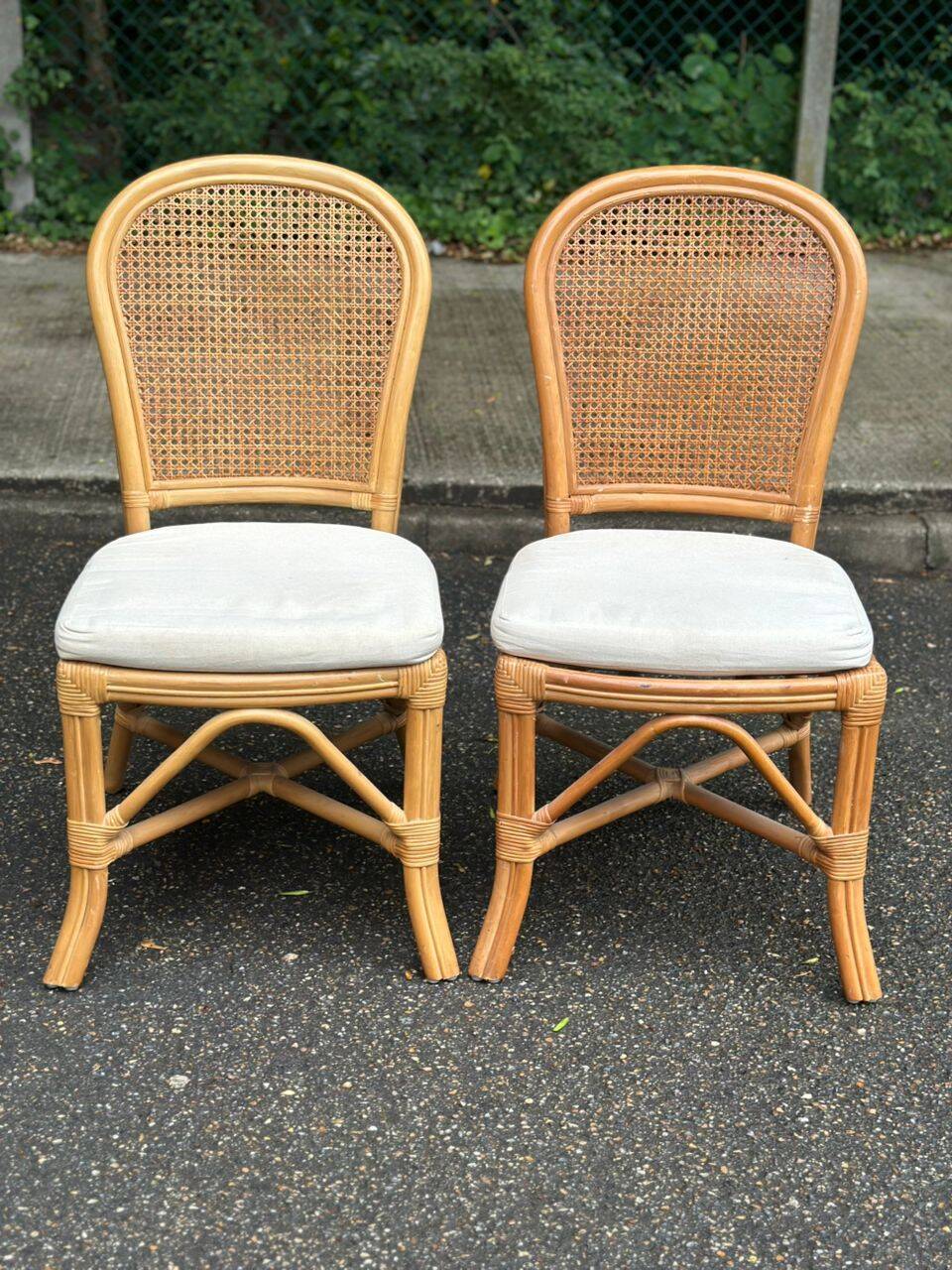 2 rattan and caned chairs in colonial bistro style from the 1990s.