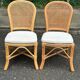 2 rattan and caned chairs in colonial bistro style from the 1990s.