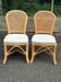 2 rattan and caned chairs in colonial bistro style from the 1990s.