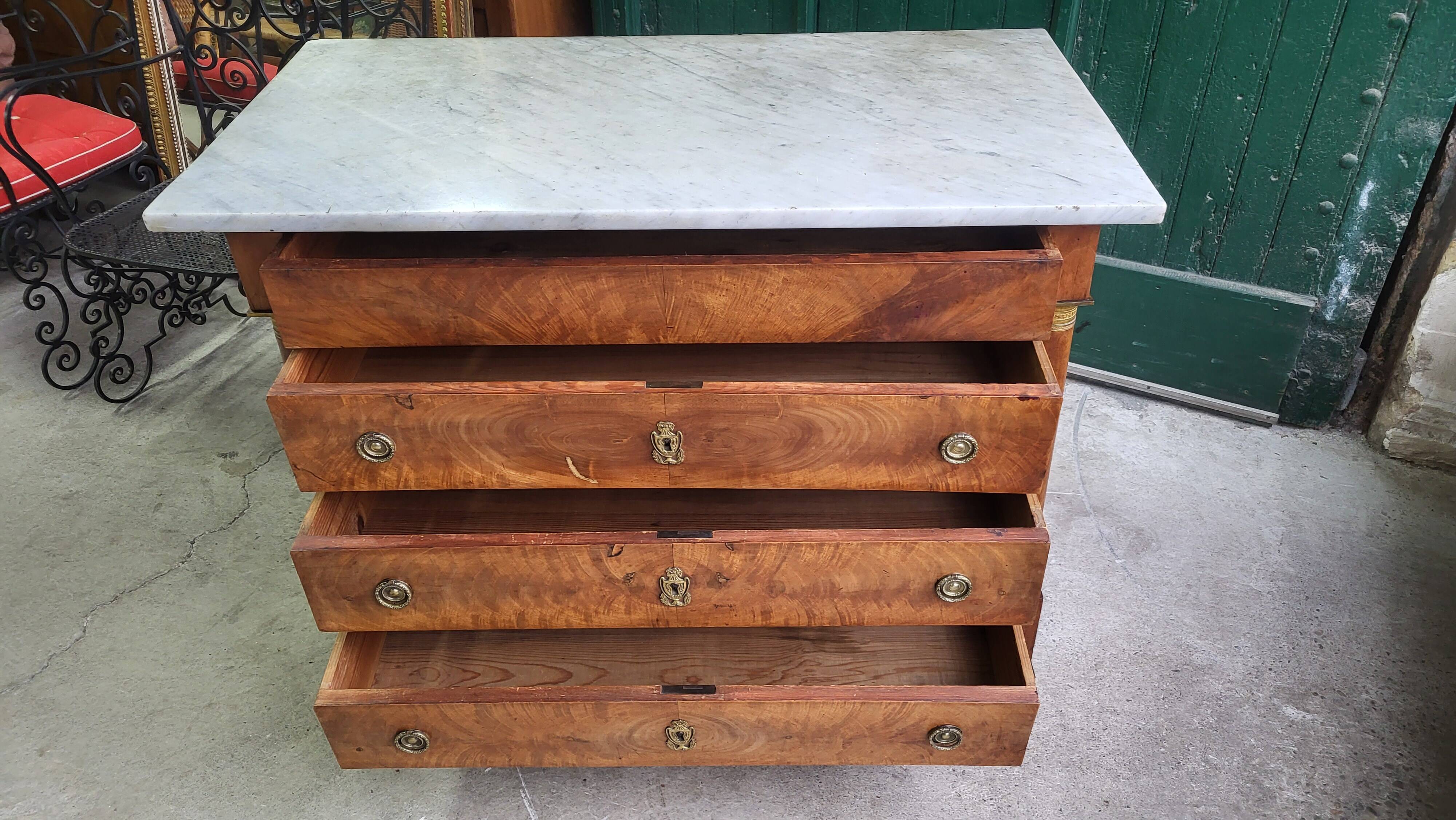 Empire commode in walnut with white marble top from the 19th century