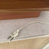 Scandinavian mirror with wooden frame and backlighting.