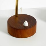 A pair of mid-century modern bedside lamps with perforated metal shades