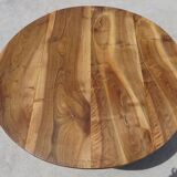 Round drop-leaf table made entirely of solid walnut