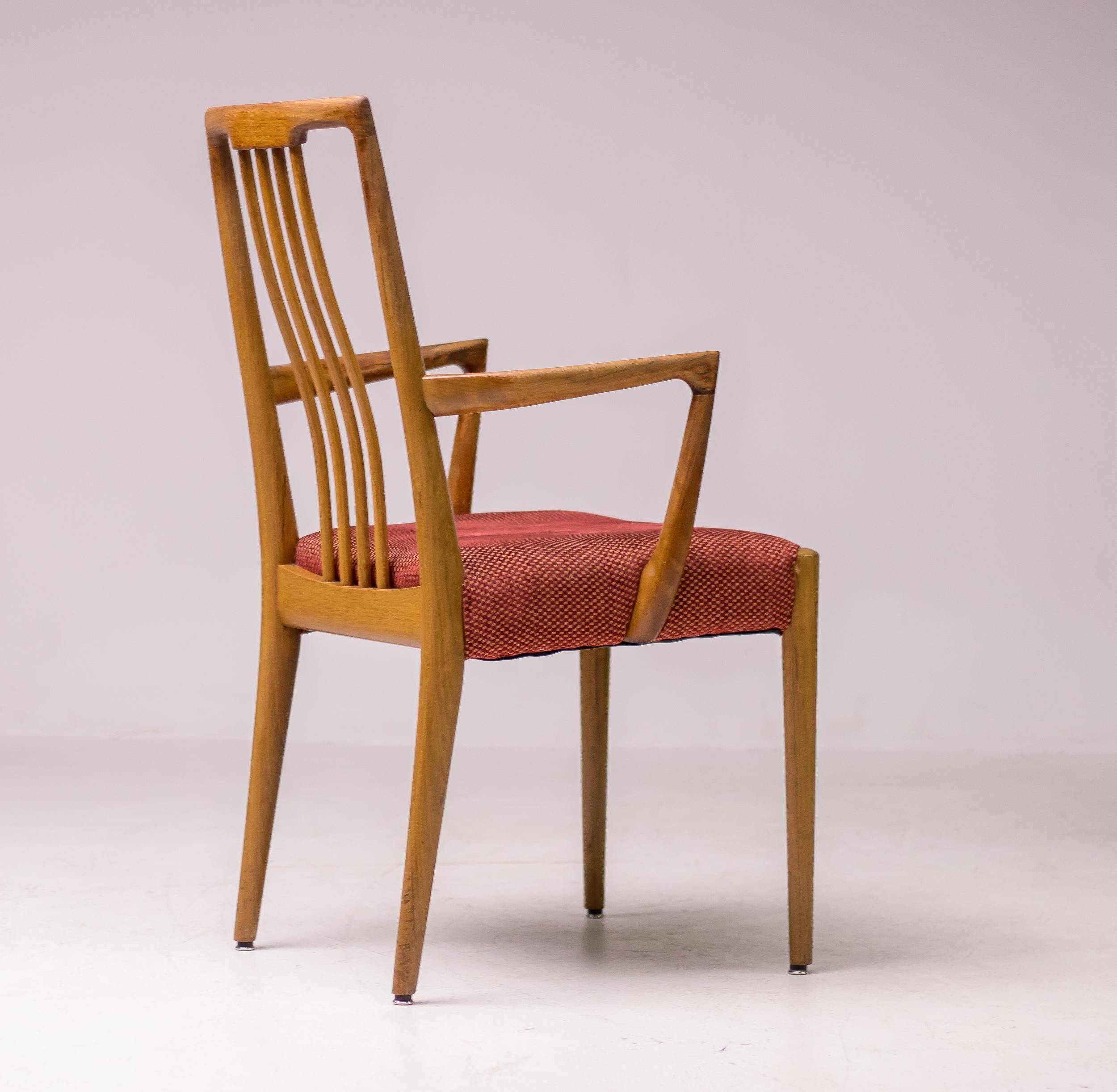 Set of six carved walnut dining chairs, Italy, 1955