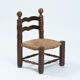 Chaise basse en bois avec assise en paille dans le style de Charles Dudouyt, années 1950