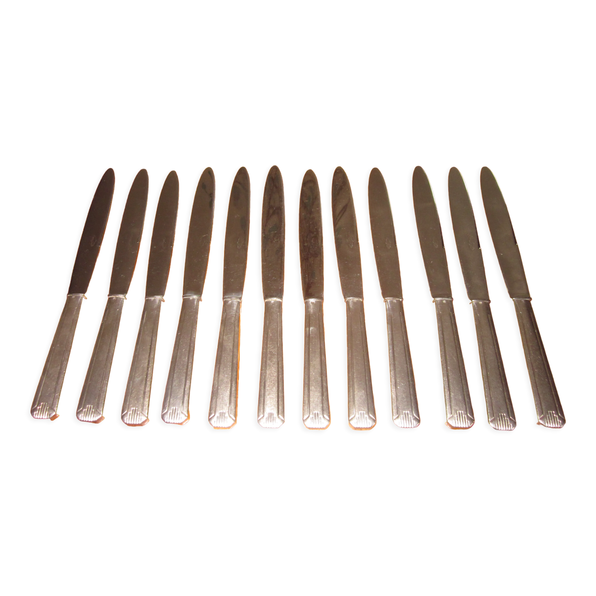 12 couteaux en metal argentè