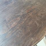 Small rustic antique tripod side table made of solid wood.