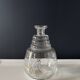 Vintage glass carafe with floral decoration