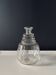 Vintage glass carafe with floral decoration