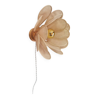 Flower wall light made of rattan petals and gold fabric