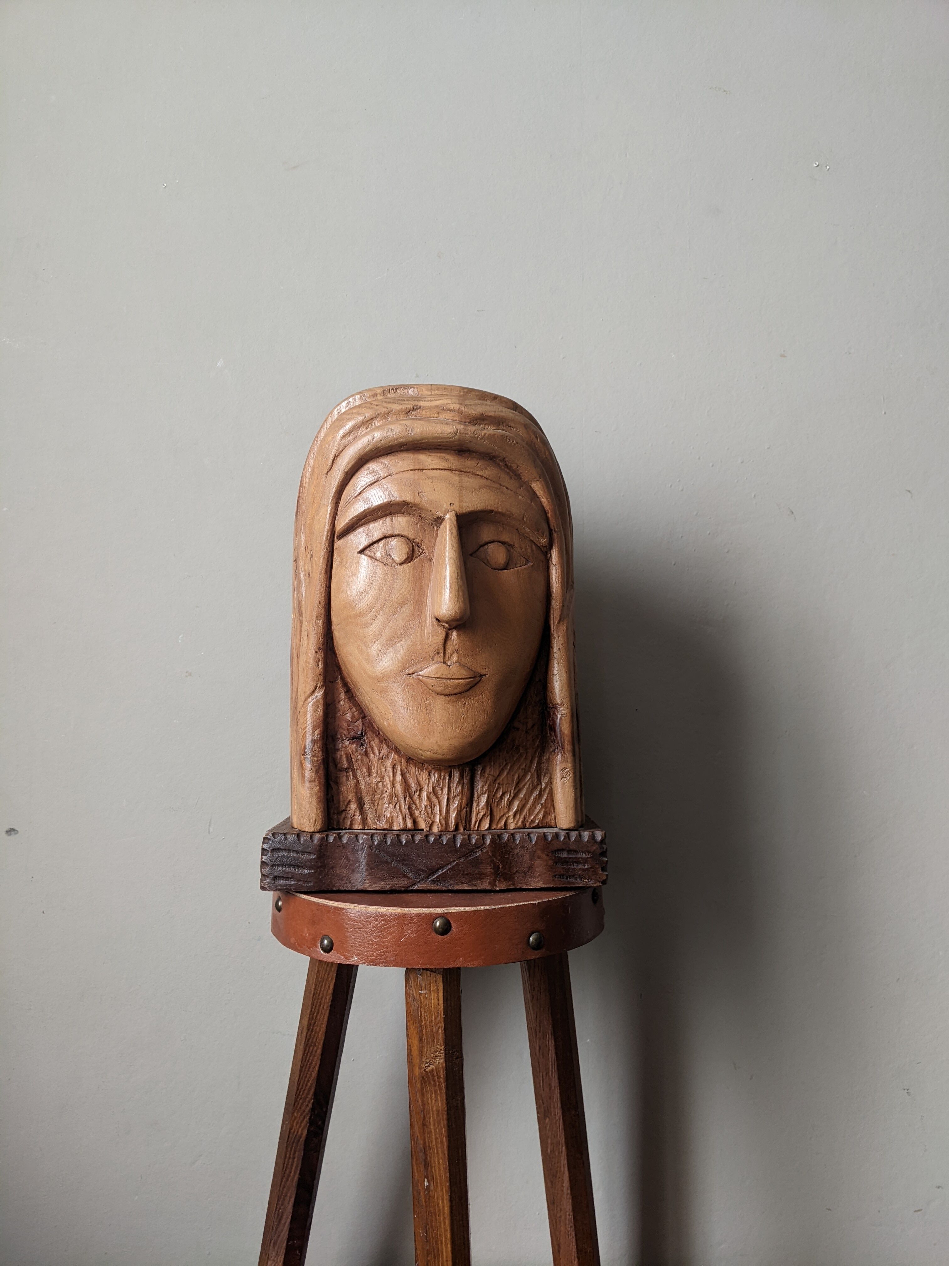 Handcrafted sculpture of the head of Christ in elm.