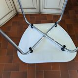 White plexiglass chair