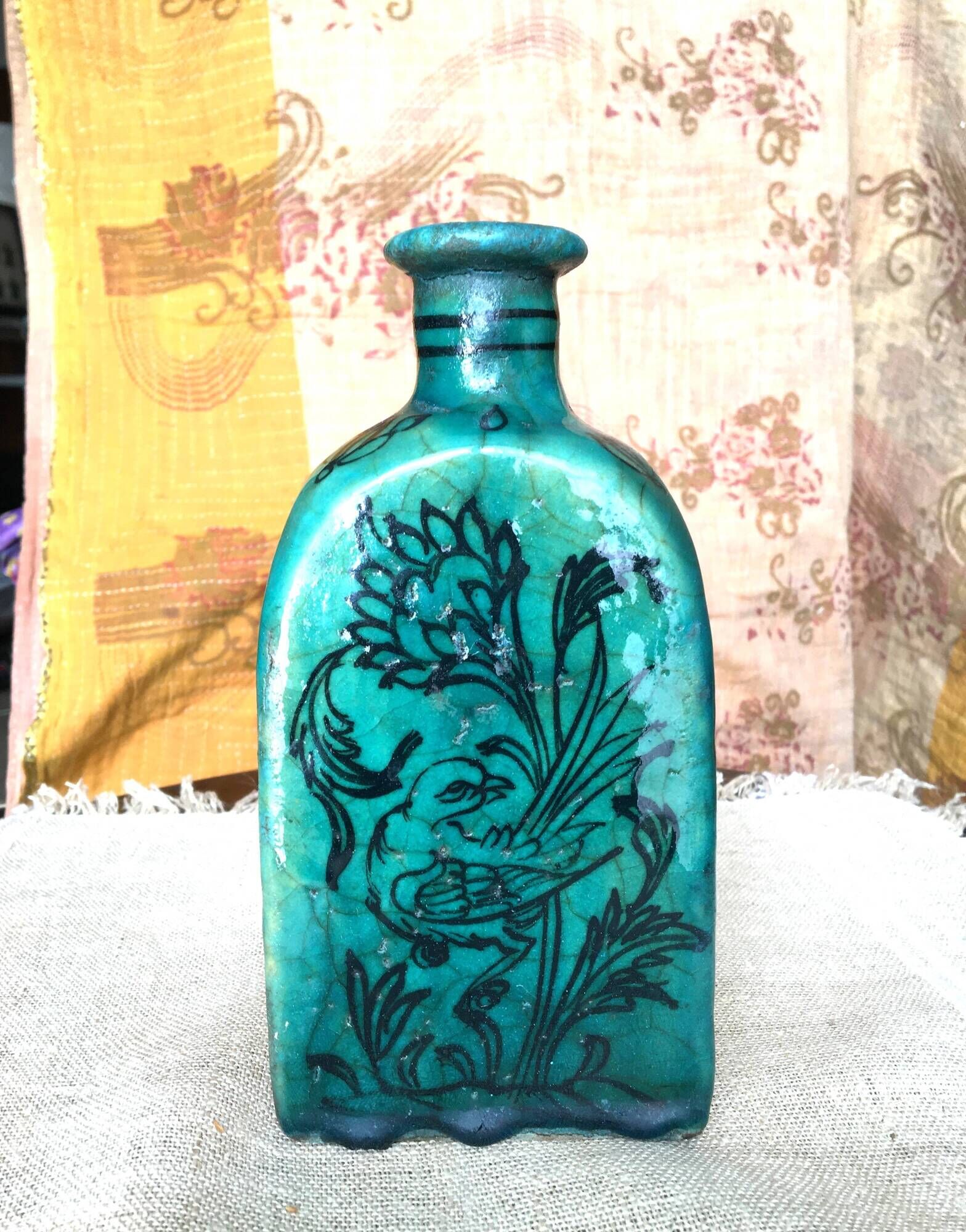 Antique Iranian three-sided blue ceramic bottle