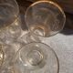 9 art-deco glasses in engraved crystal with gold trim