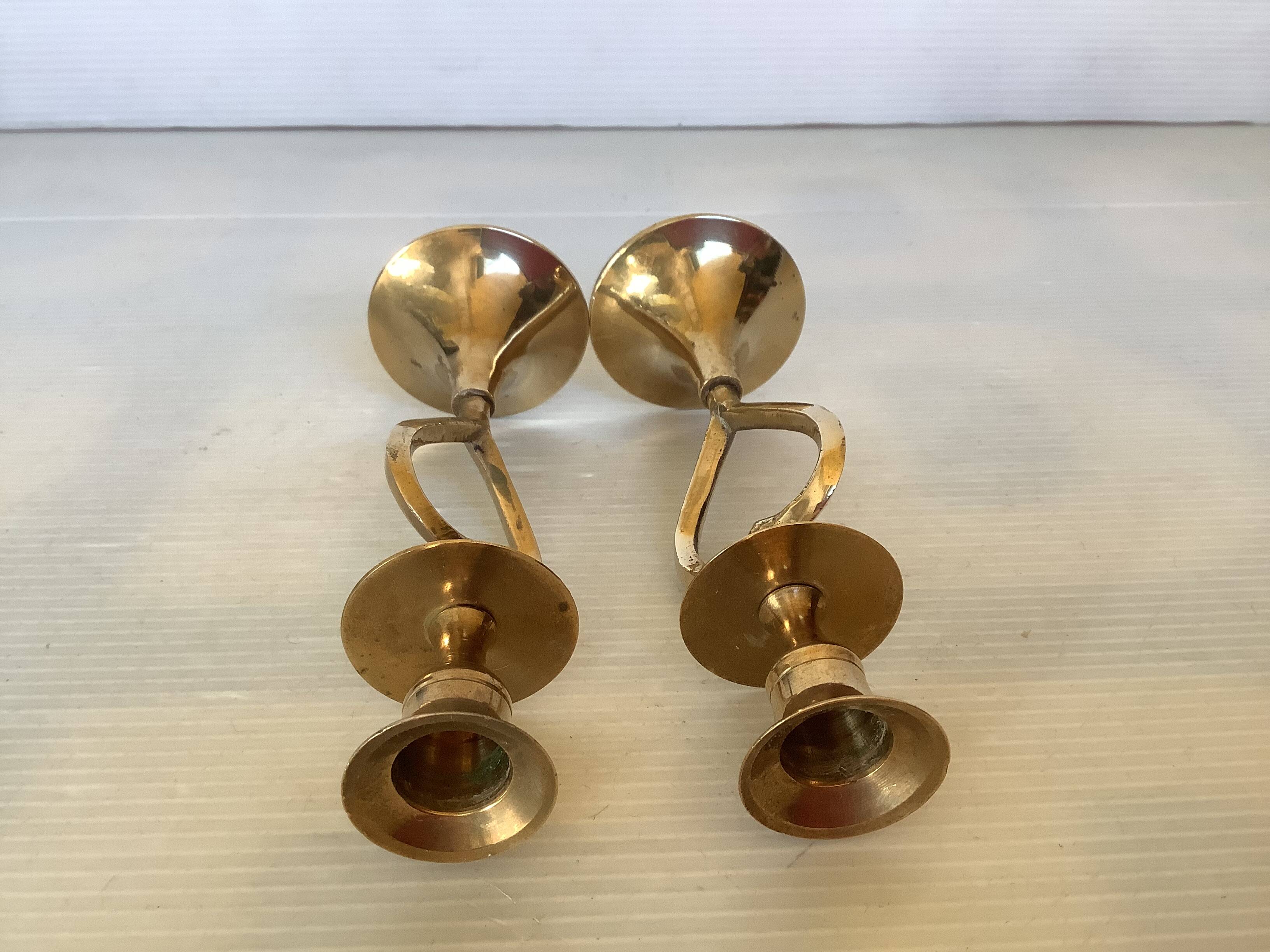 Pair of small brass heart candlesticks