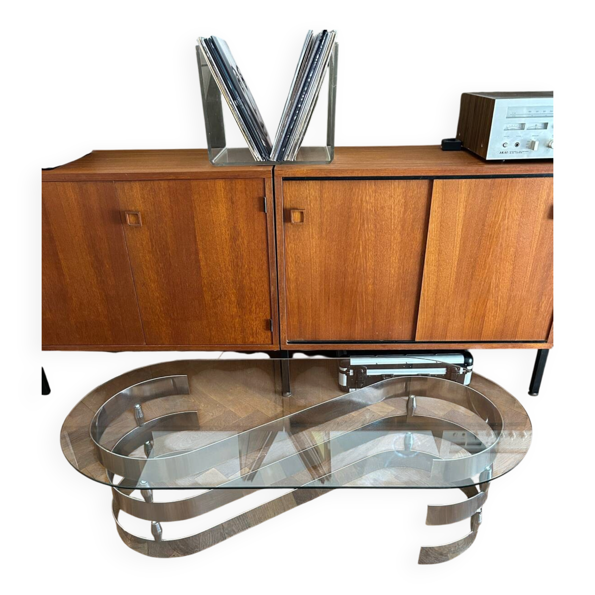 70s design oval coffee table in glass with chrome legs.