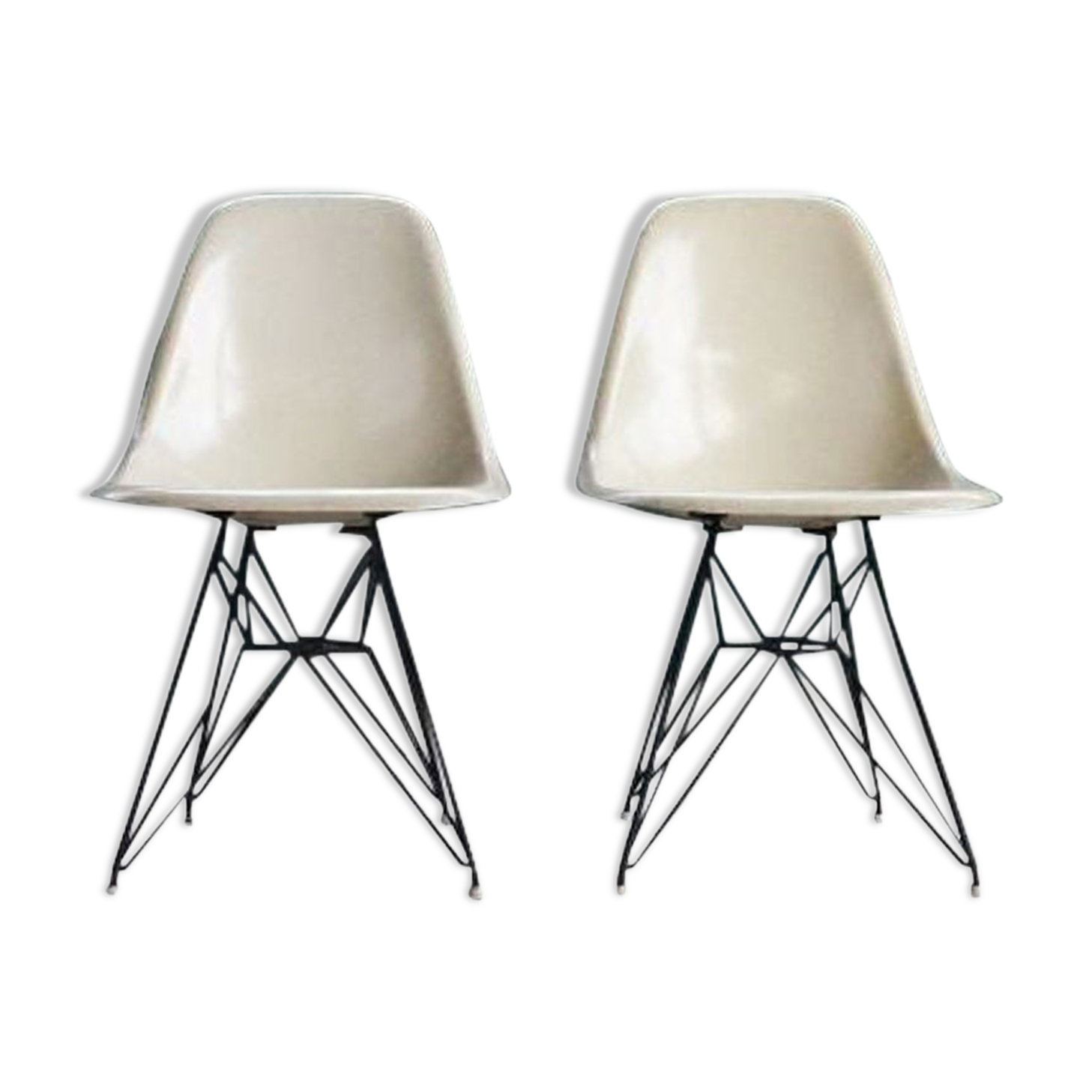 Pair of vintage Charles Eames eggshell and fiberglass chairs