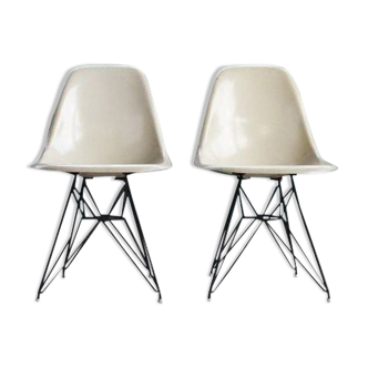 Pair of vintage Charles Eames eggshell and fiberglass chairs