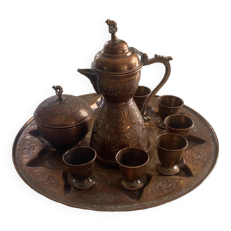 Old Moroccan tea service in red copper