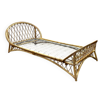 1960s rattan bed with metal base.
