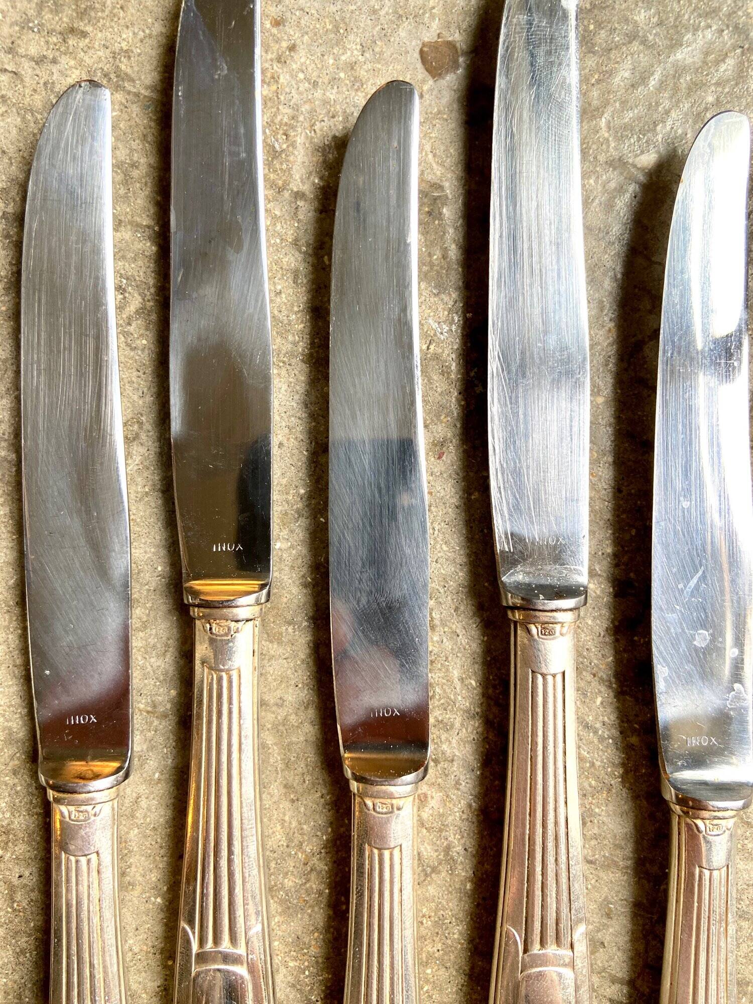 6 silver metal knives