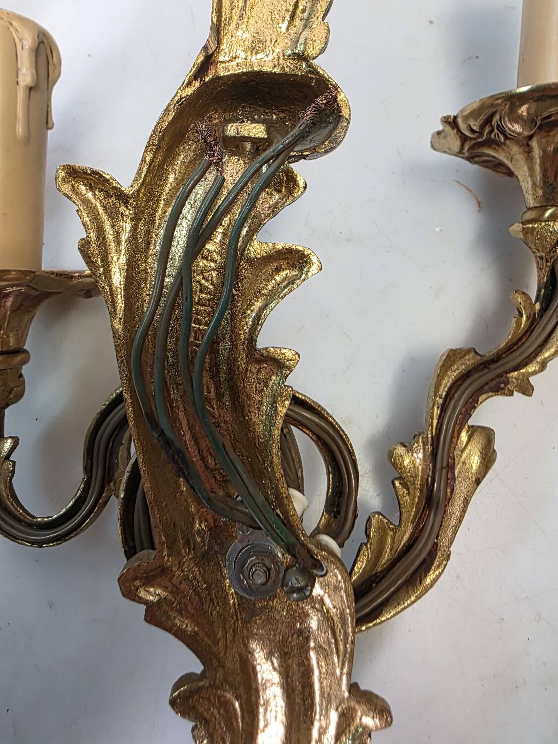 Pair of Louis XV style bronze wall sconces