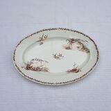 Large oval serving dish in Creil and Montereau earthenware Model Marine, iron earth