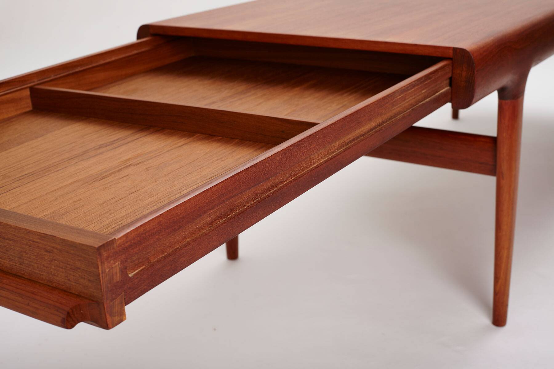 Extendable coffee table designed by Johannes Andersen for Uldum Møbelfabrik, Denmark, 1960s.